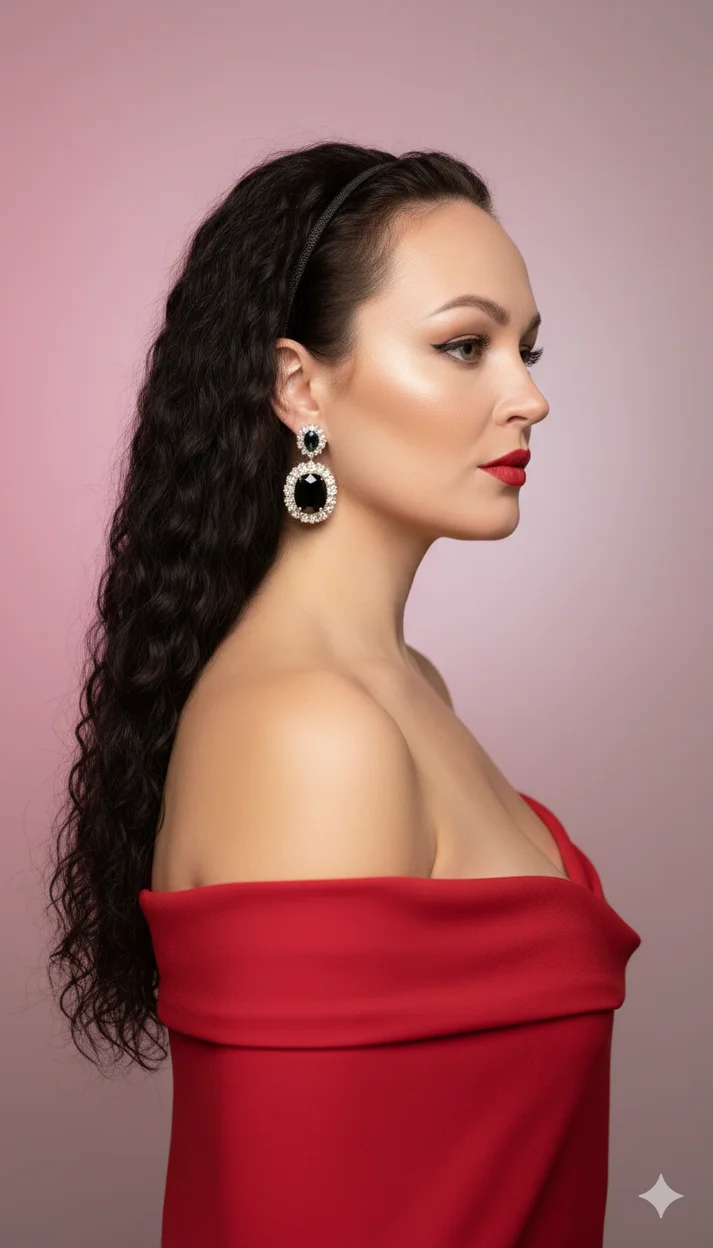 Девушка в красной драпировке в профиль с серьгами 